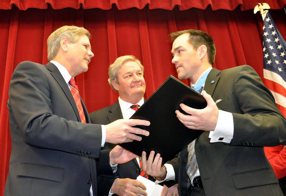 North Dakota Honors Romesha-February, 2013- Senator Hoeven presents Medal of Honor recepient Clinton Romesha with a Senate floor tribute at a reception in Bismarck honoring Romesha. 